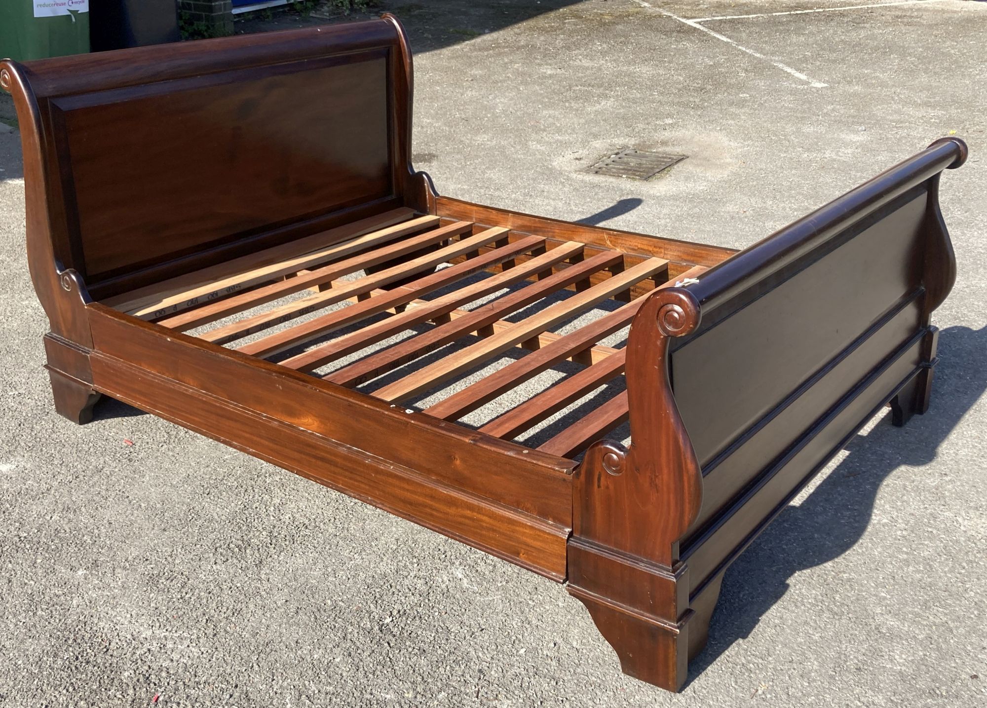 A reproduction mahogany sleigh bed, width 145cm, length 205cm